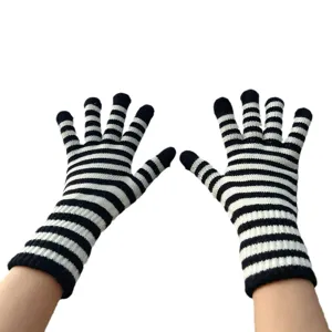 Striped knit fingerless gloves for women and men, winter warm black and white hand warmers.