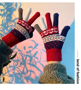Winter warm knitted gloves with stylish Nordic patterns, cozy touch screen design for women.