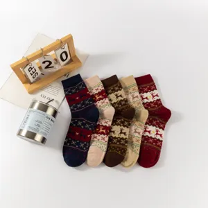 Cozy Christmas mid-calf socks with vintage deer knit patterns for winter warmth.