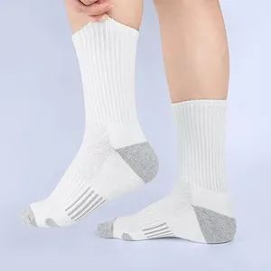 Detailed view of breathable cotton athletic mid-tube socks with grey heel and toe color block.