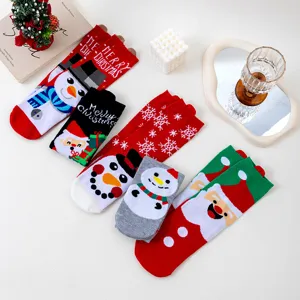 Christmas cotton socks feature cute snowman and Santa Claus patterns, warm and festive design.