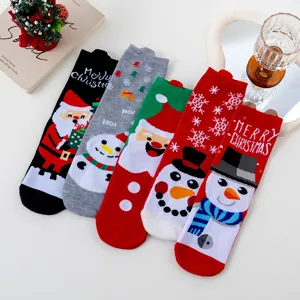Cute Christmas cotton mid-tube socks featuring Santa and snowman designs, warm winter wear.