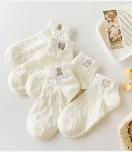 Cute white short socks with sweet embroidery designs, breathable thin low-cut socks for women.