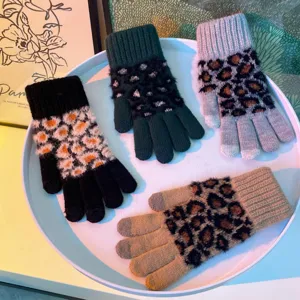 Winter women's warm touch screen knitted gloves with stylish leopard print pattern, cozy.