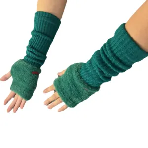 Green knitted arm warmers, cozy long fingerless gloves for women, autumn winter fashion style.