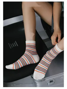 Japanese style striped mid-calf socks for men and women, trendy breathable casual cotton daily wear.