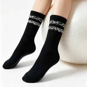 Anti-slip yoga socks for women, black pilates grip socks with leopard stripes for floor.