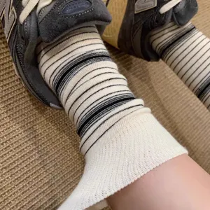 Trendy striped socks for women and men, breathable spring summer cotton slouch crew socks.
