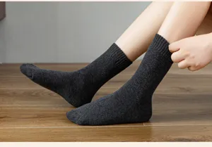 Thickened loop pile cotton mid-tube socks in solid dark gray, warm and breathable detail view.