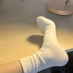 Solid color mid-calf slouch socks for women, breathable casual cotton daily wear style.