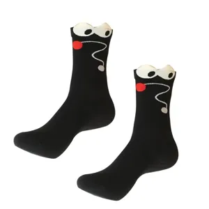 Cute black long socks with funny 3D cartoon eyes design, trendy cotton socks for women daily wear.