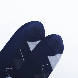 Detailed close-up of men's breathable argyle pattern dress socks in navy blue.