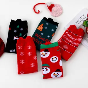 Christmas cotton mid-tube socks flat lay detail featuring cute snowman and snowflake designs.
