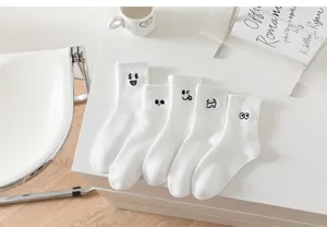White mid-calf socks for women featuring cute funny embroidery expressions, casual cotton.