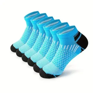 Detailed view of breathable blue athletic ankle socks featuring honeycomb mesh design.