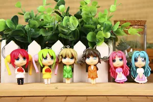 Cute anime girl keychains 6-piece set, cartoon character bag charms and accessory pendants.