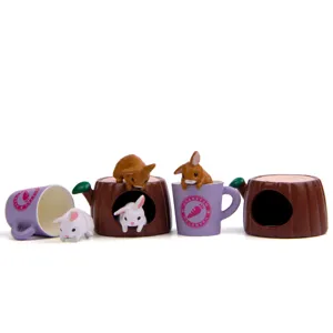 Cute miniature rabbit figurines with tree stump cups for DIY landscaping and dollhouse decor.