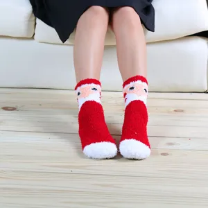 Cozy Christmas fuzzy socks for women, thick coral fleece winter floor socks with cute Santa.