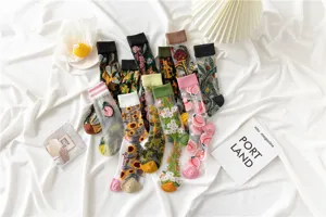 Sheer mesh mid-calf socks featuring 3d floral embroidery, sweet style summer hosiery for women.