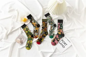 Sheer mesh mid-calf socks with delicate 3d floral and cute animal embroidery for summer style.