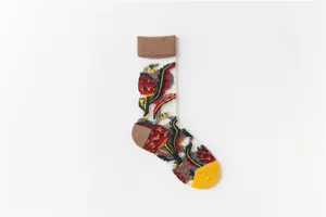 Sheer floral embroidered mid-calf socks with contrast brown cuff, heel and yellow toe.
