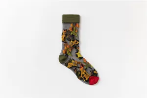 Detailed view of sheer black mesh mid-calf sock with cute cat embroidery and colorful details.