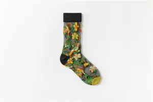 Close-up of sheer mesh mid-calf socks featuring colorful 3D floral and bird embroidery.