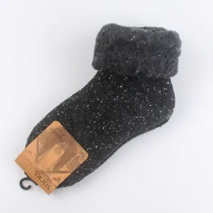 Detailed view of thick thermal fleece-lined wool snow socks for women in winter.