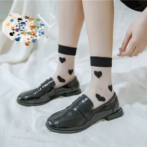 Sheer crystal glass silk socks with black heart patterns, fashionable summer thin crew socks.
