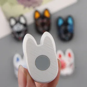 Detailed close-up shot of resin 3D Japanese fox mask fridge magnet and phone case accessory.