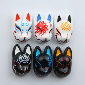 Resin Japanese kitsune mask detail, cute decorative accessory for fridge magnets and phone cases.