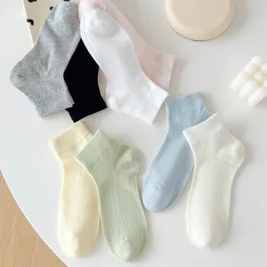 Solid color ribbed short socks for women, comfortable breathable cotton ankle socks for daily wear.