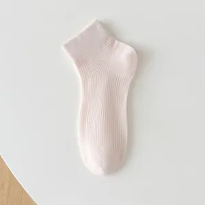 Detail shot of light pink seamless women ankle socks, breathable mesh summer short sock.