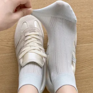 Comfortable women mesh short socks with breathable ribbed design, elastic and soft daily wear.