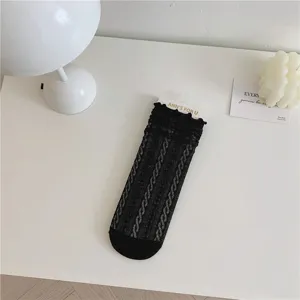 Calzini al polpaccio in pizzo nero con volant, carini stile Lolita calze a rete trasparenti.