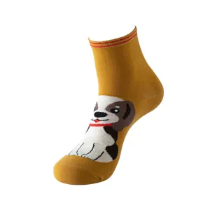 Cute cartoon dog pattern women mid tube cotton socks in vibrant yellow, detailed knit cozy daily wear.