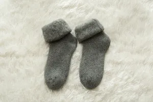 Cozy grey thermal fleece-lined knit socks detail shot, soft plush interior for winter warmth.