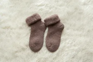 Cozy thick warm winter wool socks in coffee brown, fluffy snow socks for women comfort.