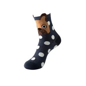 Close-up detail view of cute cartoon dog pattern mid-calf socks featuring white polka dots.