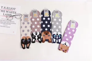 Cute cartoon dog pattern mid tube socks with colorful polka dots, soft knit detail shot.