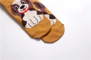 Detail view of women's cute cartoon dog pattern mid tube cotton socks, casual daily wear.