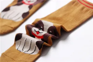 Detailed view of women mid-calf cotton socks featuring cute cartoon dog pattern design.