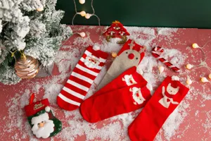 Christmas 3D cartoon mid-tube socks detail, set of 4 pairs featuring festive holiday styles.