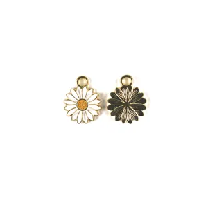 Detailed close-up of cute daisy enamel alloy charms, showing front and back textures.