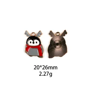 Joli pendentif en émail alliage manchot de Noël pour bijoux DIY et porte-clés élégant.