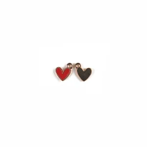 Detail shot of mini heart charms, red enameled and gold alloy pendant for DIY jewelry making.