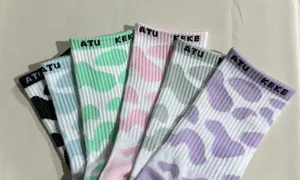 Colorful cow print mid-tube socks for women, cute Harajuku style fashion daily cotton socks.