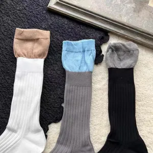 Chaussettes empilées de style Dongdaemun pour femmes, chaussettes mi-mollet bicolores.