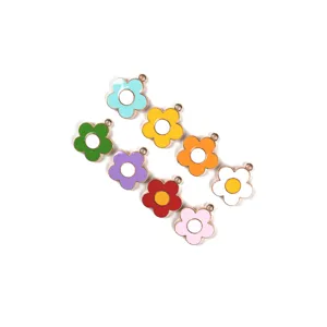 Close-up of colorful enamel flower charms alloy DIY jewelry pendant accessories details.