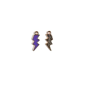 Detail view of DIY lightning bolt enamel alloy charms for keychain necklace jewelry crafting.